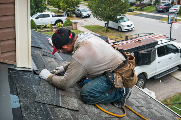 Professional Storm Damage Roof Repair technician working in Linville Falls, NC